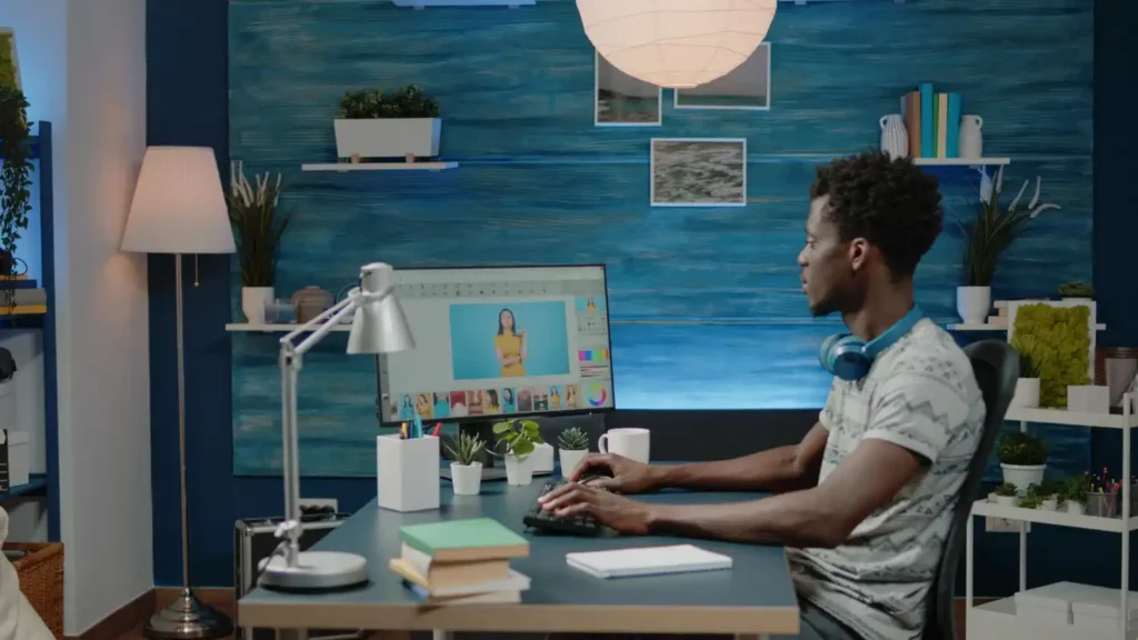 young black man with a desktop