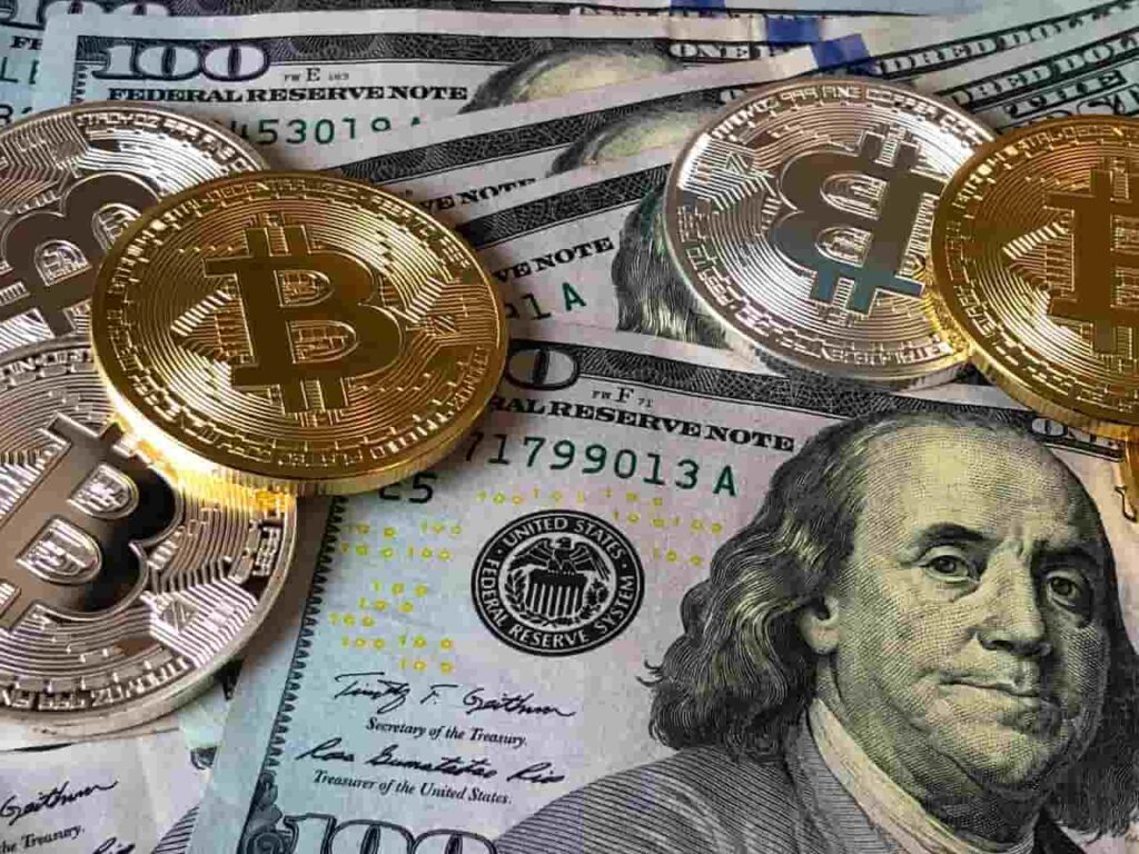 
US-Dollar-Bills-and-Bitcoins