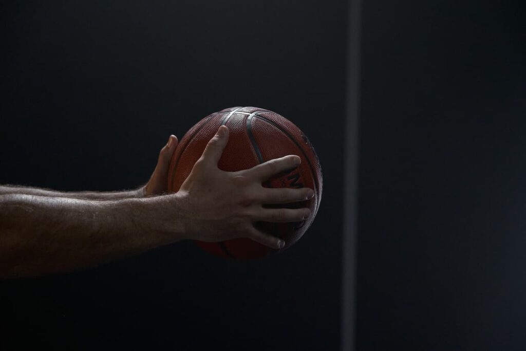 black-hands-holding-a-basketball