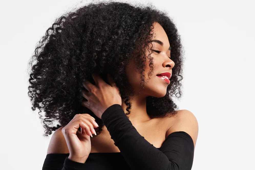 spotcovery-Lady-with her curly hair-black-hair-common-problems-and-solutions