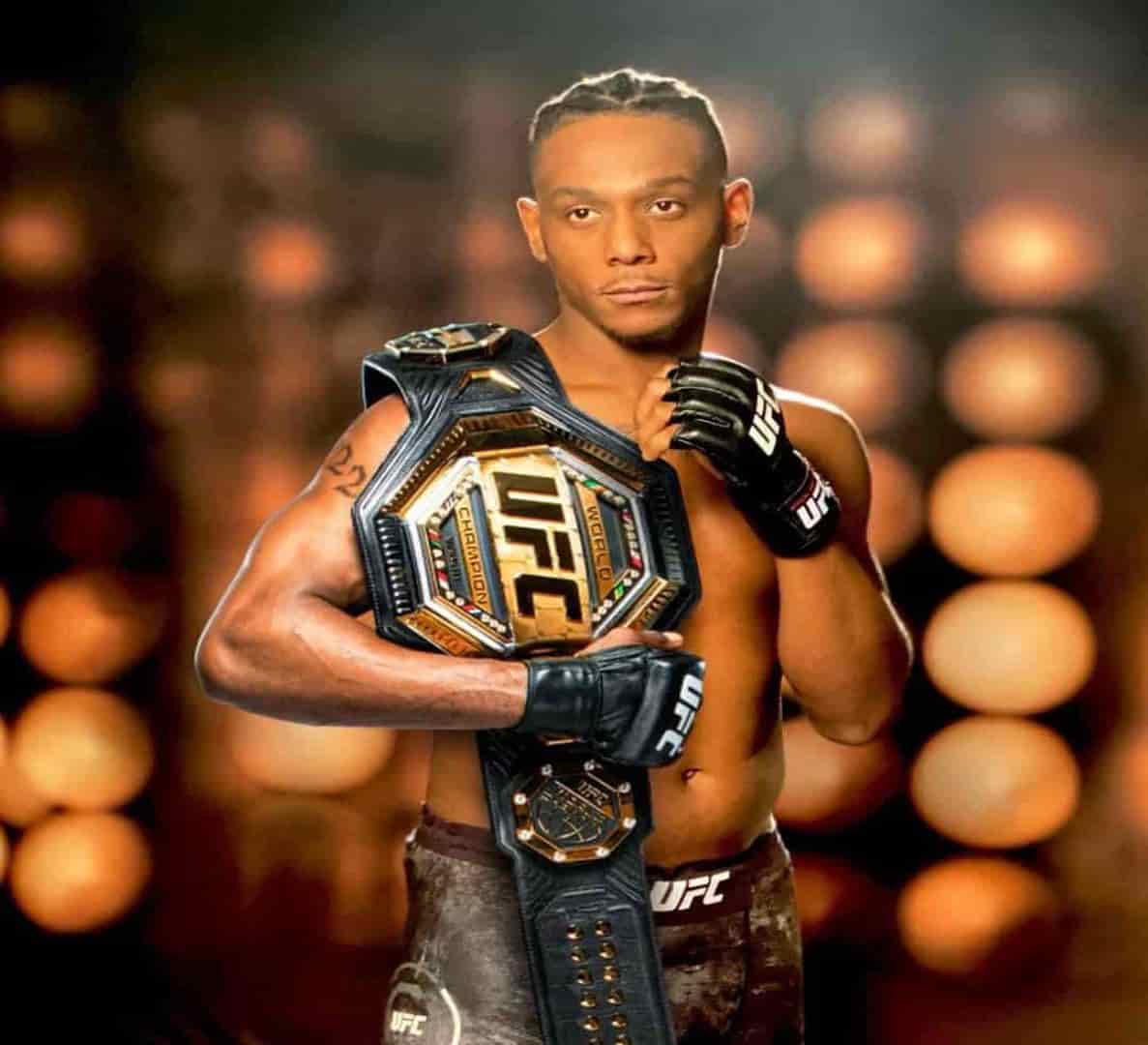 spotcovery-jamahal-hill-black-ufc-fighter-with-championship-belt