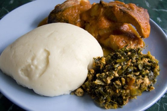Nsima is served with Vegetable sauce and Meat.