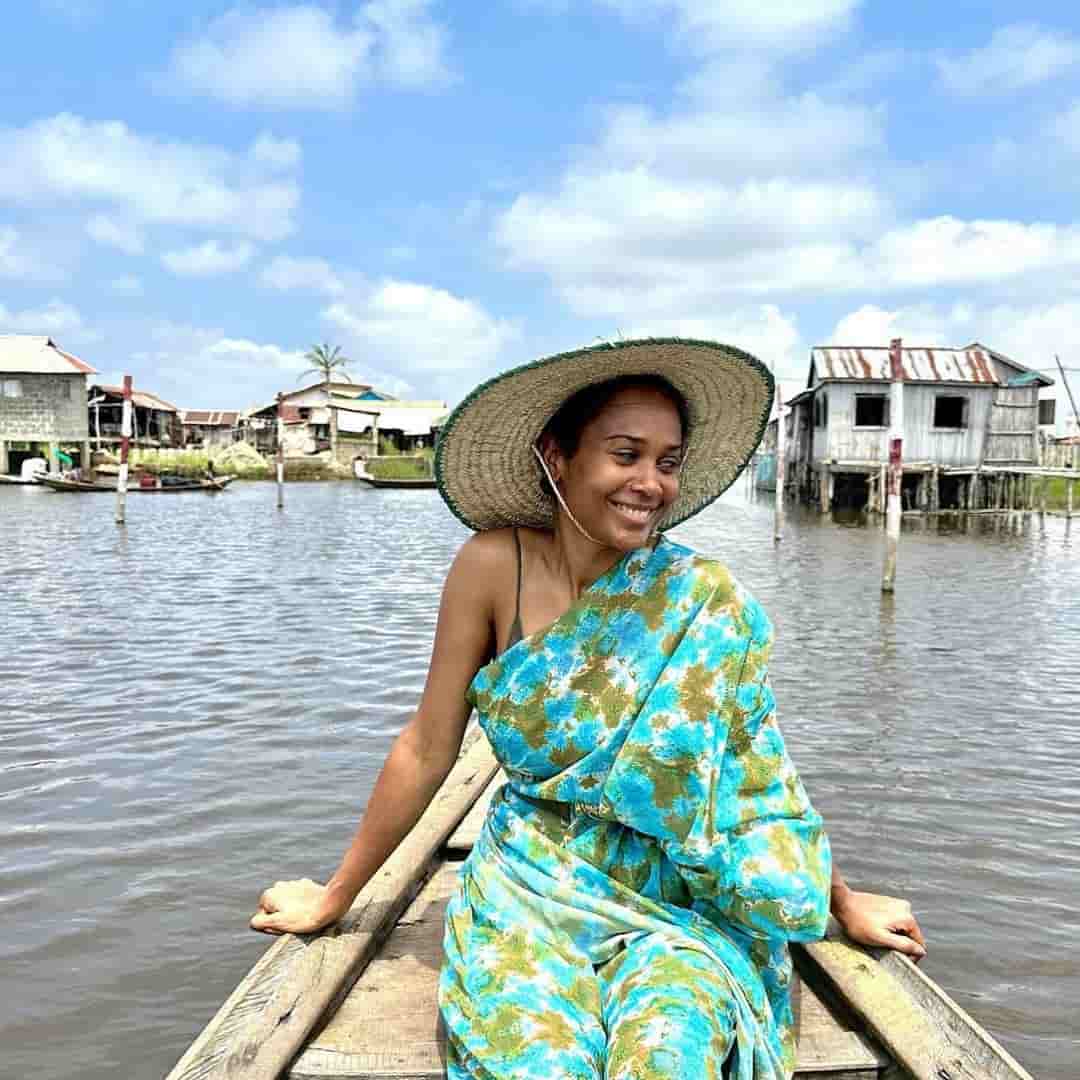 spotcovery-A-woman-on-a-boat-in-Benin-west-Africa-destinations-for-black-travelers