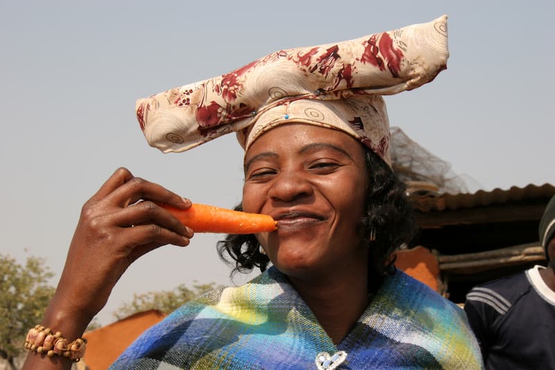 spotcovery-Herero-woman-holding-a-carrot-herero-people