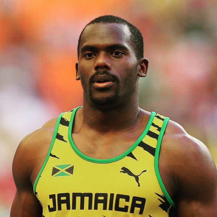 spotcovery-nesta-carter-in-a-jamaican-kit-seven-jamaican-athletes-who-tested-positive-for-drugs