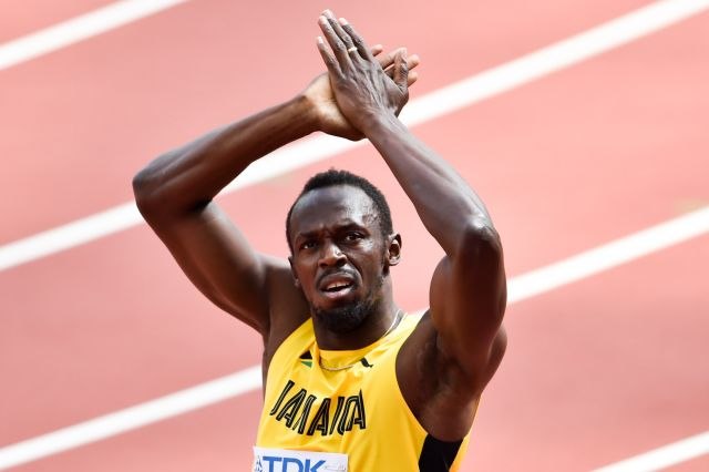 spotcovery-usain-bolt-signature-pose-usain-bolt-record-scientists-debate-whether-it-can-be-broken