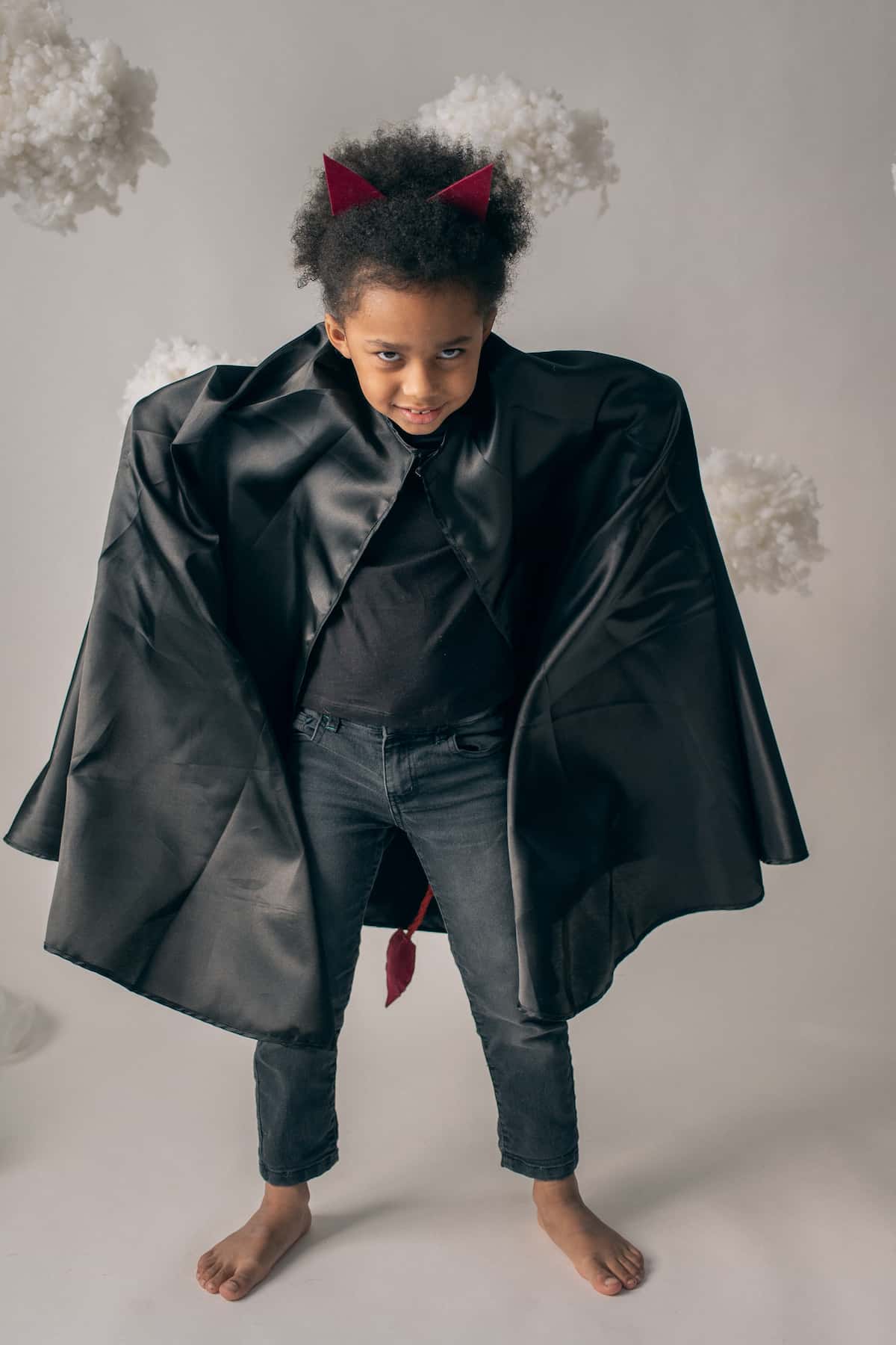spotcovery-little-girl-in-leather-cloak-and-devils-horns-kids-fashion-top-6-black-owned-clothing-stores-in-the-us