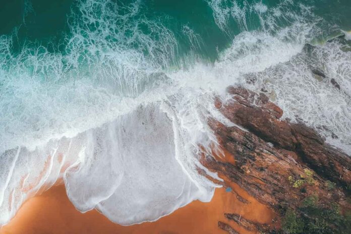 spotcovery-stormy-sea-with-sandy-shore-5-best-black-owned-water-companies-making-a-difference