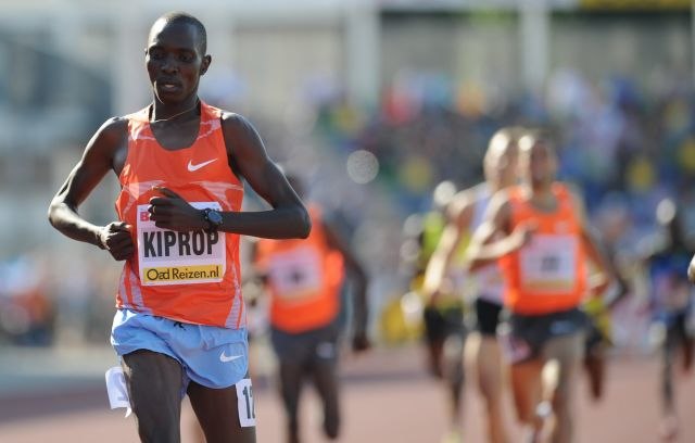spotcovery-asbel-kiprop-holding-kenyan-flag-african-sport-six-kenyan-athletes-banned-for-doping