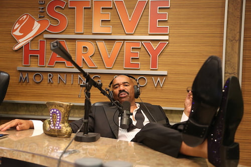 spotcovery-steve-harvey-hanging-his-feet-up-u-during-his-show