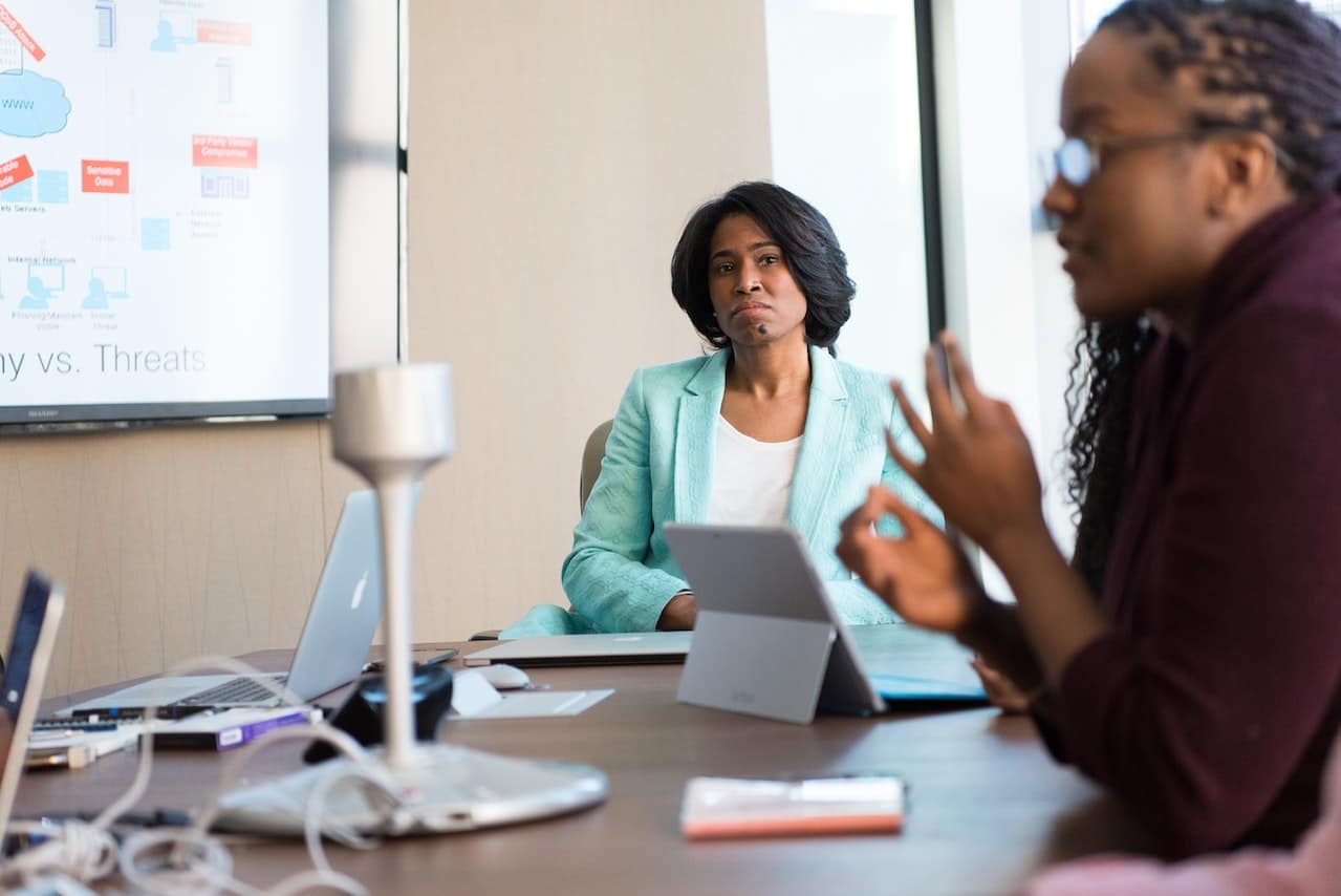 spotcovery-two-black-women-discussing-about-their-business-image-source-pexels-licenced-by-cc-by-2.0