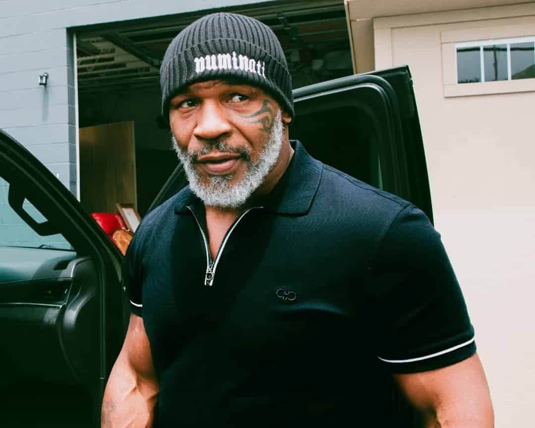 spotcovery-mike-tyson-in-black-shirt-and-hat-seven-surprising-broke-black-athletes-you-should-know
