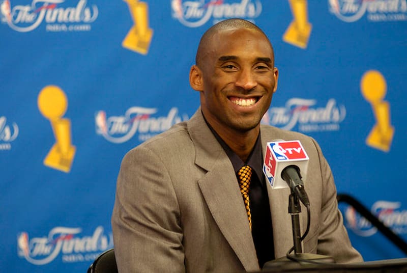spotcovery-kobe-bryant-smiling-at-a-press-conference