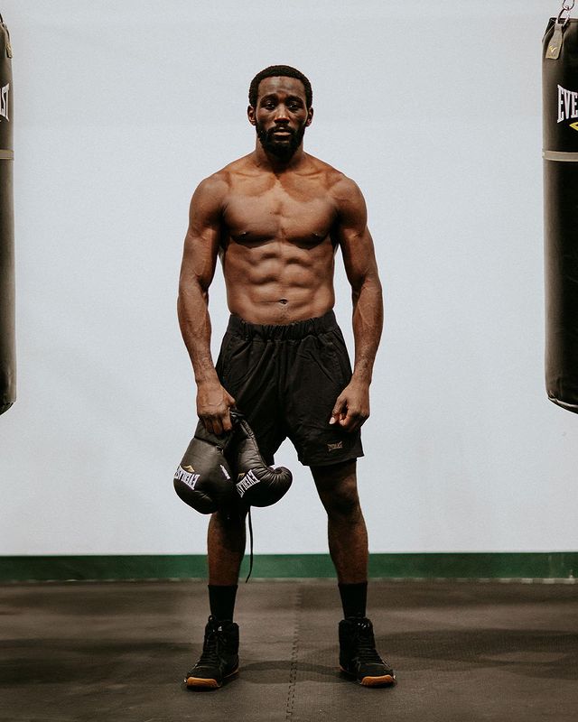 spotcovery-terence-crawford-posing-with-his-boxing-gloves