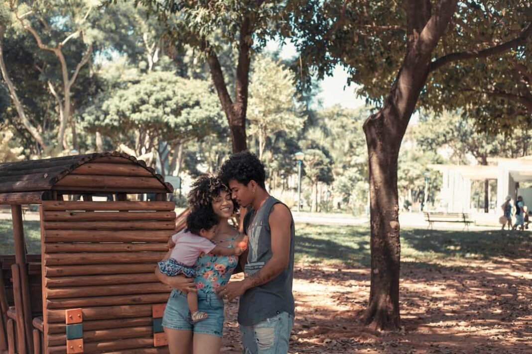 7 Major Money Problems in Marriage Black Couples Should Know spotcovery-family-standing-near-wooden-playhouse-7-major-money-problems-in-marriage-that-black-couples-should-know