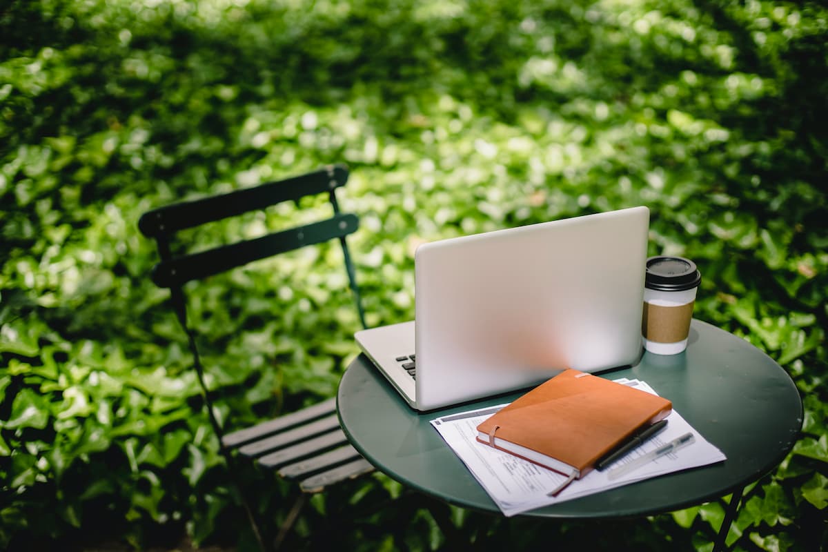spotcovery-cozy-table-with-laptop-and-notebook-in-park-5-small-business-financing-options-black-entrepreneurs-should-know