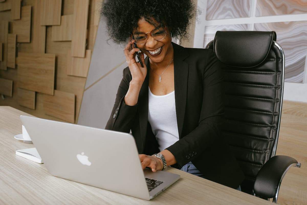 spotcovery-woman-in-black-blazer-on-call-how-direct-marketing-can-benefit-black-owned-businesses