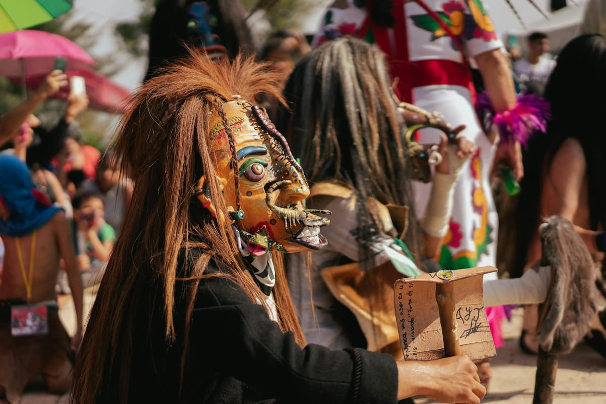 spotcovery-a-person-in-a-carnival-mask-how-did-african-culture-and-traditions-influence-mexican-culture