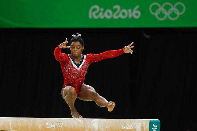 spotcovery-simone-biles-doing-a-routine-five-black-gymnasts-who-made-a-big-impact-in-the-game