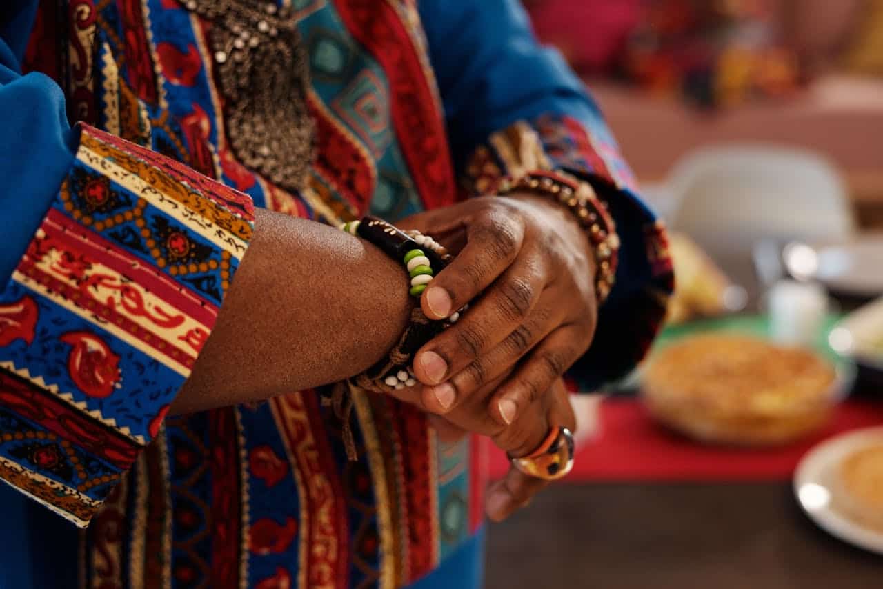 spotcovery-a-man-wearing-an-african-beaded-bracelet