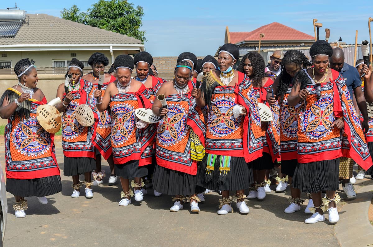 spotcovery-women-in-traditional-wear-celebrating-a-festival-black-festivals-why-you-should-attend