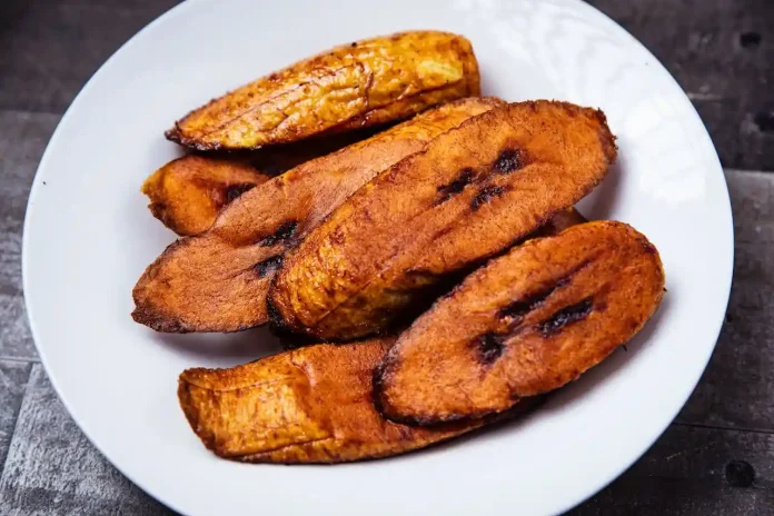 spotcovery-fried-plantains-served-on-a-plate-recipe-make-the-perfect-cuban-tostones